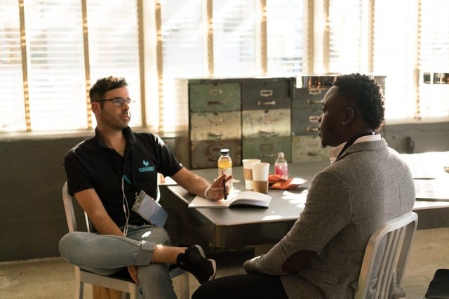 Two colleagues having conversation