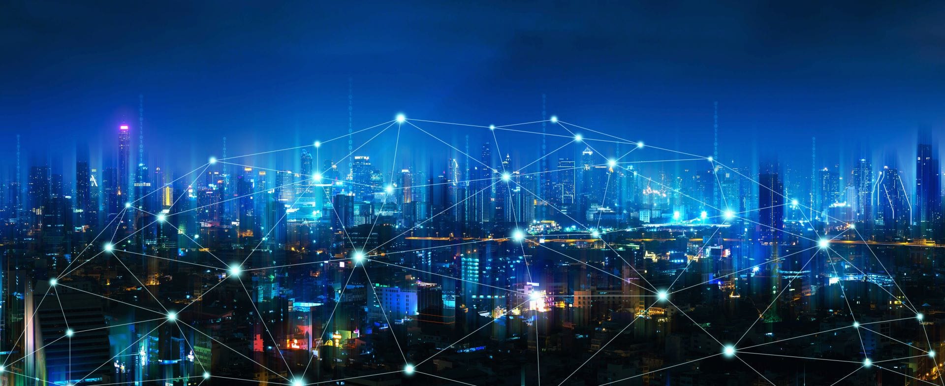 Connected smart city network over urban skyline at night, digital communication infrastructure.