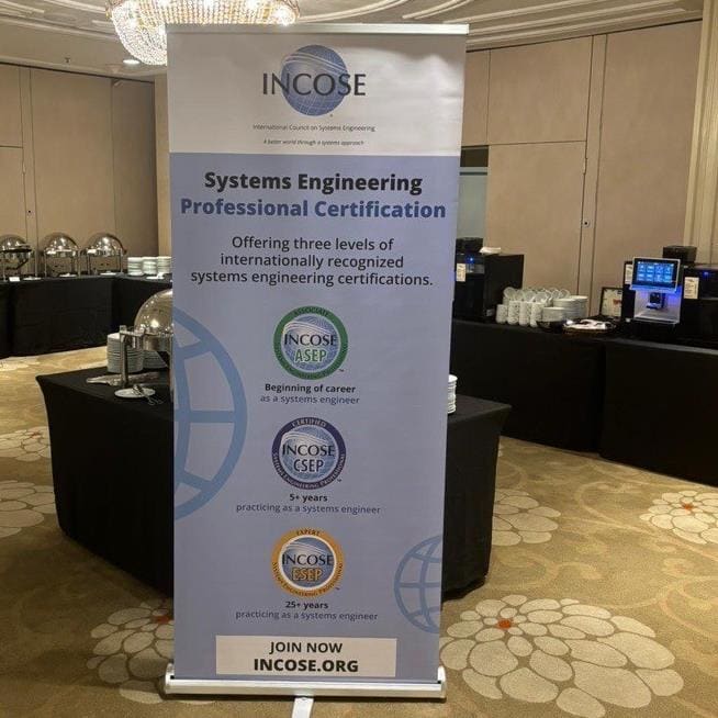 Professional Systems Engineering Certification Display at INCOSÉ Conference.