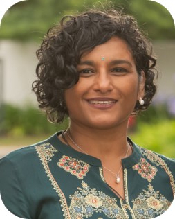 Active INCOSE member smiling outdoors at a professional event.