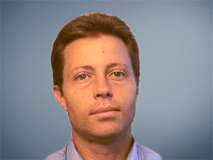 High-level INCOSE conference speaker during technical presentation.