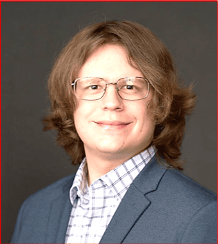 Professional man in a suit posing for business portrait.
